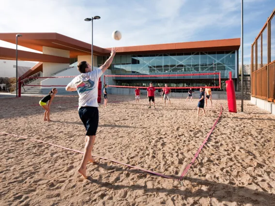 people playing beach volleyball